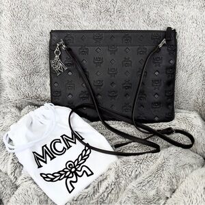 MCM Crossbody Pouch Clutch Style Bag In Monogram Leather
